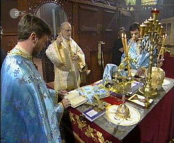 Bishop TICHON Incending the Offerings, Priest LYUBOMIR and Priest JULIAN praying at the Altar