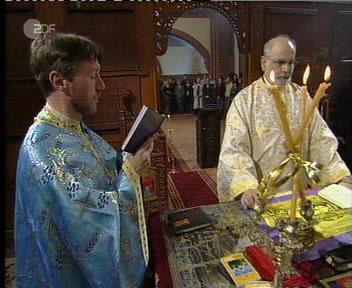 Priest LYUBOMIR and Bishop TICHON praying at the Altar